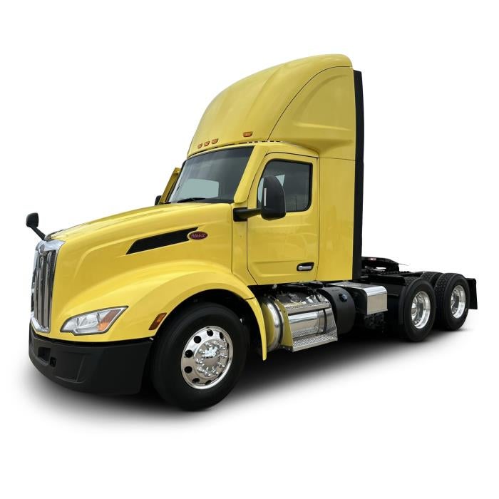 2023 Peterbilt 579 Base in Yellow — front three-quarter view